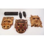 THREE EASTERN CARVED AND GILT WOOD WALL MASKS. AFRICAN EBONY BOX CONTAINING HAIR ORNAMENTS and TWO