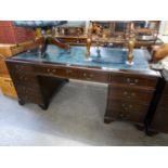 A GOOD QUALITY REPRODUCTION MAHOGANY TWIN PEDESTAL DESK, WITH BLUE LEATHER INSET TOP WITH GILT