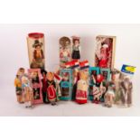 FIFTEEN CIRCA 1960s GENIUS HONG KONG AND OTHERS PLASTIC DOLLS in National costume and in original