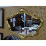 CARTOUCHE SHAPED WALL MIRROR IN GILT ROCOCO FRAME, 3' WIDE