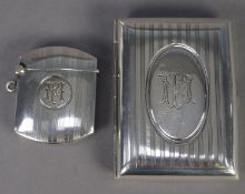 EARLY 20th CENTURY SILVER CIGARETTE CASE and MATCHING VESTA CASE, each engraved with FM monogram,