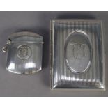 EARLY 20th CENTURY SILVER CIGARETTE CASE and MATCHING VESTA CASE, each engraved with FM monogram,