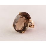 DRESS RING, claw set with a large oval citrine, 7.5gms