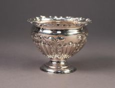 VICTORIAN EMBOSSED SILVER PEDESTAL SMALL BOWL, of part fluted form with wavy rim, decorated with