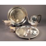 THREE PIECE ELECTROPLATED TEASET BY FRANK WOOD, SHEFFIELD, of part fluted oval form with black