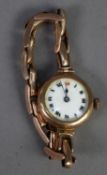 LADY'S EDWARDIAN 9ct GOLD WRISTWATCH with Swiss mechanical movement, white porcelain roman