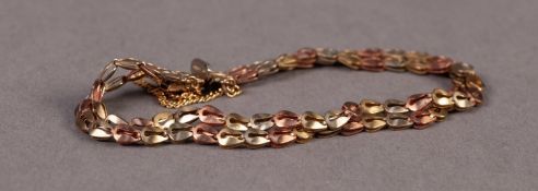 9ct GOLD TWO STRAND FANCY LINK BRACELET with safety chain, 7.2 gms