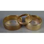 TWO 9ct GOLD BROAD WEDDING RINGS, size Q/R and U/V and a small, narrow 9ct GOLD WEDDING RING, ring