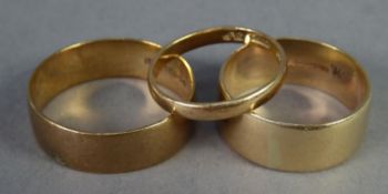 TWO 9ct GOLD BROAD WEDDING RINGS, size Q/R and U/V and a small, narrow 9ct GOLD WEDDING RING, ring