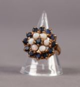 9ct GOLD, SAPPHIRE AND OPAL THREE TIER FLORAL CLUSTER RING, set with a centre small sapphire,