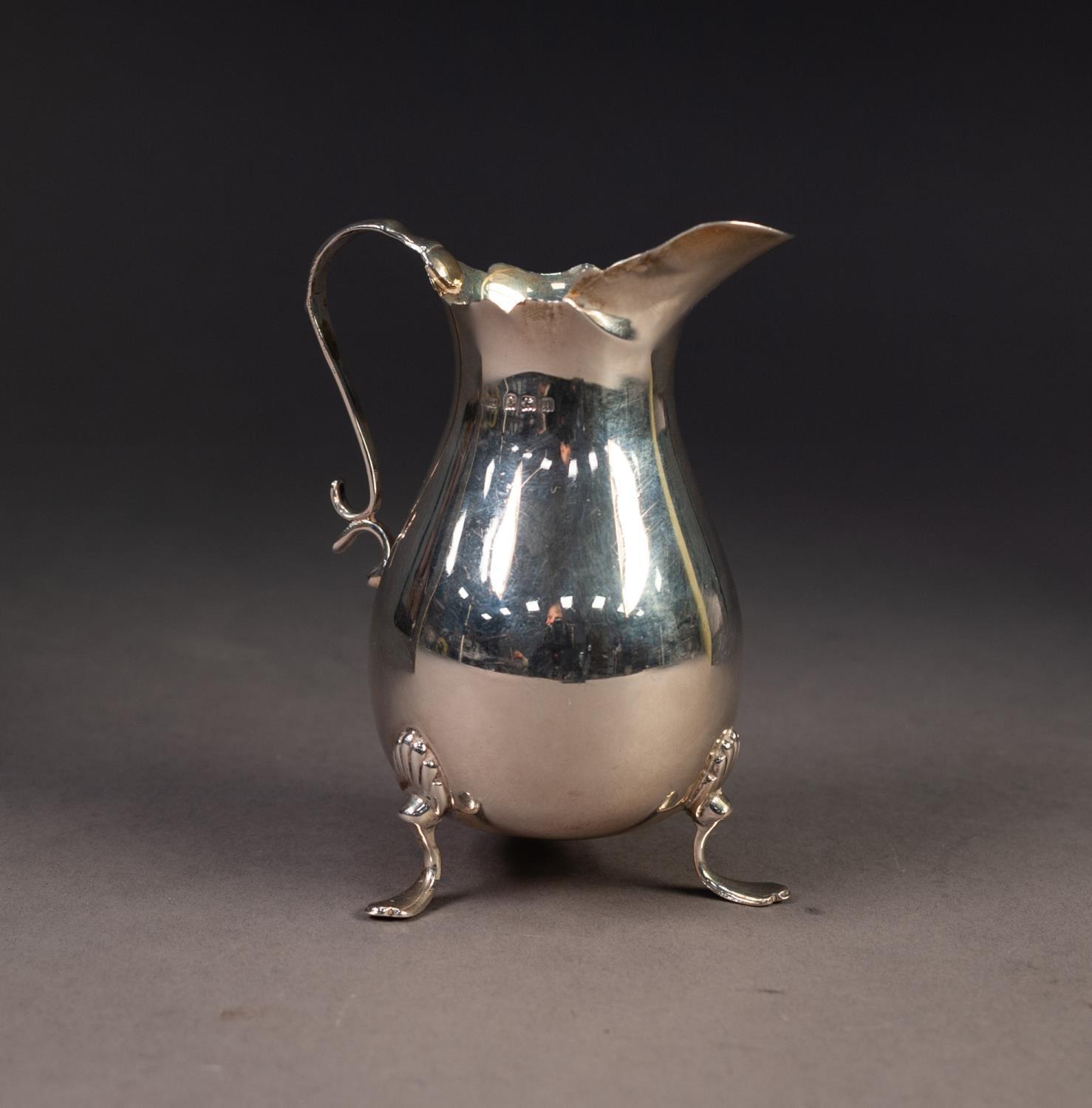 GEORGE V PLAIN SILVER CREAM JUG, of pyriform with shaped rim, scroll handle and shell capped - Image 3 of 6