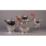 STYLISH ART DECO FOUR PIECE ELECTROPLATED TEASET, of oblong form with brown angular scroll handles