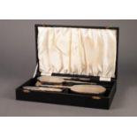 *CASED THREE PIECE ENGINE TURNED SILVER BACKED DRESSING TABLE HAND MIRROR AND BRUSH SET BY ADIE