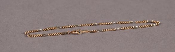 9ct GOLD FINE CHAIN BRACELET with tiny curb link sections and long link spacers, 1.6 gms