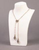 SILVER TRACE CHAIN NECKLACE with seed pearls on each link and having a central retainer enamelled in