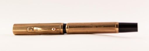 WATERMAN'S 'IDEAL' FOUNTAIN PEN the black plastic body having engine turned 9ct gold mount and lever