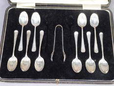 EDWARD VII CASED PART SET OF TEN SILVER, RAT TAIL PATTERN, TEASPOONS AND MATCHING PAIR OF SUGAR