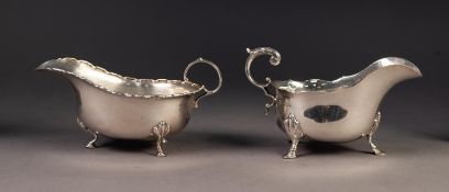 TWO SILVER SAUCE BOATS, one with scalloped rim, acanthus capped flying scroll handle and triple