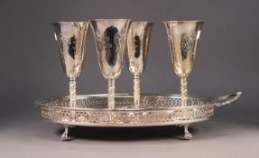SET OF FOUR ELECTROPLATED GOBLETS, engraved with stylised motifs, together with an ELECTROPLATED TWO
