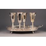 SET OF FOUR ELECTROPLATED GOBLETS, engraved with stylised motifs, together with an ELECTROPLATED TWO