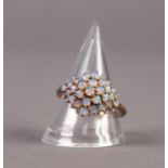 9ct GOLD & OPAL DOMED CLUSTER RING, set with 25 small cabochon opals, 3.3 gms