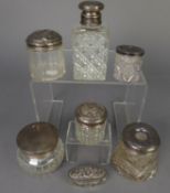 SEVEN GLASS CONTAINERS WITH PULL-OFF SILVER LIDS, toilet jars, scent bottle (glass a/f), hair