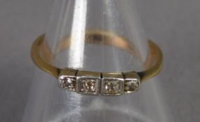 18ct GOLD RING with four tiny diamonds, in square setting, ring size J/K, 2 gms