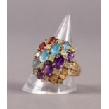 9ct GOLD COCKTAIL RING, the domed top set with 4 oval pale blue zircons, 4 oval amethyst, 2 oval