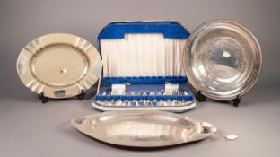 *CASED SET OF SIX PAIRS OF ELECTROPLATED FISH EATERS, together with a TWO HANDLED OVAL PLATTER, OVAL