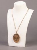 9ct GOLD CHAIN NECKLACE, 2.6 gms and engraved oval LOCKET PENDANT with 9ct gold back and front