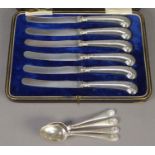 GEORGE V CASED SET OF SIX AFTERNOON TEA KNIVES WITH FILLED SILVER PISTOL GRIP HANDLES, Sheffield