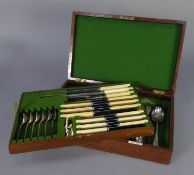 EDWARDIAN OAK CASED CANTEEN OF WALKER & HALL ELECTROPLATED CUTLERY for six place settings