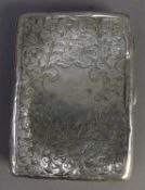 EDWARD VII ENGRAVED SILVER CARD CASE, of oblong form with ivory note tablet to the tan coloured