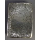 EDWARD VII ENGRAVED SILVER CARD CASE, of oblong form with ivory note tablet to the tan coloured