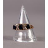 9ct GOLD RING SET WITH THREE OVAL SAPPHIRES, separated by two pairs of small diamonds, ring size