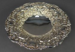 GEORGE IV silver shallow bowl richly repousse with flowers, leafage, coquillage and scrollwork at