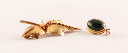 18k GOLD BROOCH IN THE FORM OF TWO LEAVES SET WITH A SINGLE PEARL, 2" long, 8.9 gms and a GOLD