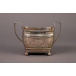 GEORGE III ENGRAVED SILVER TWO HANDLED LARGE SUGAR BASIN, of rounded oblong form with angular scroll