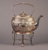 FANCY ELECTROPLATED SPIRIT KETTLE ON STAND, of oval form, embossed with flowers and scrolls, lacks