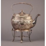 FANCY ELECTROPLATED SPIRIT KETTLE ON STAND, of oval form, embossed with flowers and scrolls, lacks