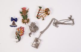 TWO MARCASITE FLORAL SPRAY BROOCHES, TWO ENAMEL GILT METAL BROOCHES viz bagpipes and tartan and