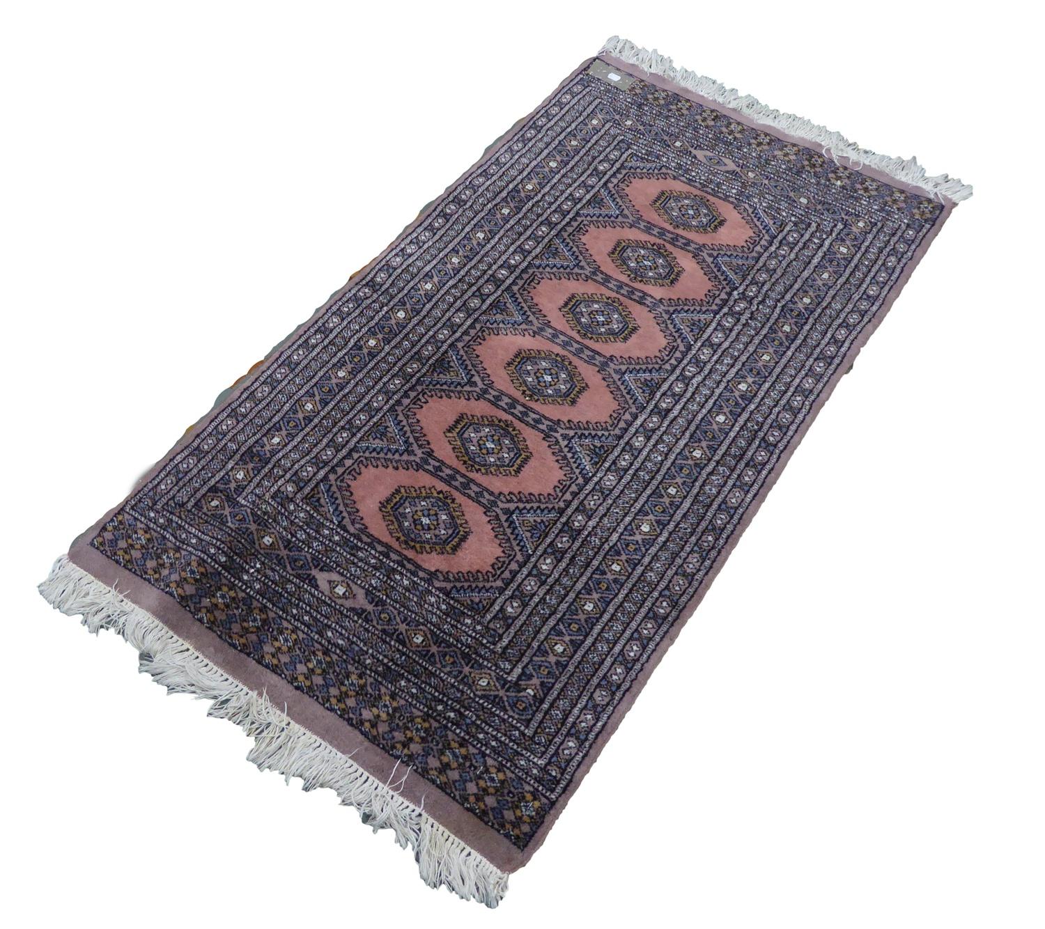 PAKISTAN BOKHARA RUG, with a row of six guls on a salmon pink field, multiple narrow border stripes, - Image 2 of 2