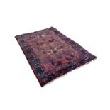 SHIRAZ PERSIAN RUG, with stylised cloud band and rams horn ladder pattern in alternate red and