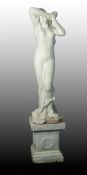 WHITE PAINTED COMPOSITION STONE SEMI NUDE FEMALE FIGURE, modelled standing with hands clasped