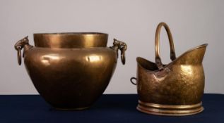 TWO HANDLED BRASS JARDINIÈRE, with Middle Eastern style captive mask ring handles, 12 ½? (31.7cm)