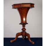 VICTORIAN CARVED AND FIGURED WALNUT LADY?S OCTAGONAL WORK TABLE, the moulded and hinged top