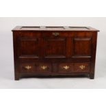 LATE EIGHTEENTH CENTURY OAK MULE CHEST, the butterfly hinged, triple panelled top enclosing a candle