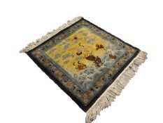 CHINESE PART SILK PICTORIAL RUG OR HANGING, depicting a crane flying off a rock amidst waves, the