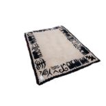 MODERN DESIGN INDIAN ALL-WOOL HAND MADE RUG, 'Masai' pattern, with plain beige field and embossed