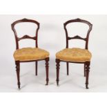 PAIR OF LATE VICTORIA CARVED MAHOGANY DRAWING ROOM SINGLE CHAIRS, each with foliate carving to the